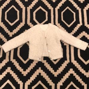 White Sherpa sweater jacket.